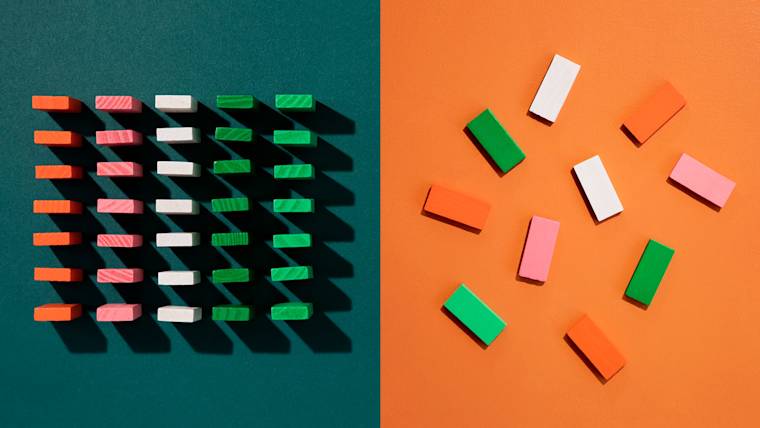 Rows of dominos standing up and on the other side, fallen down