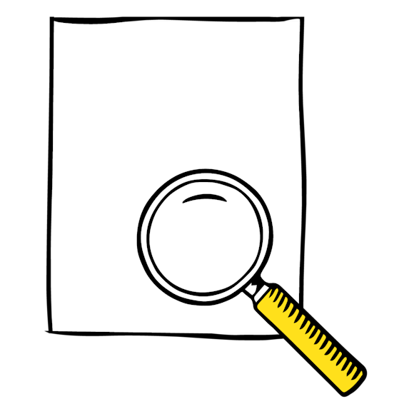 magnifying glass and piece of paper