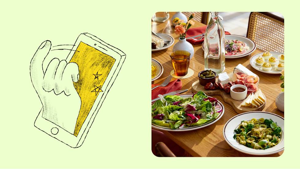 Swiping on a phone, table of salads and pastas