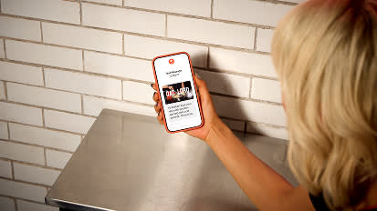 A girl holding a smartphone