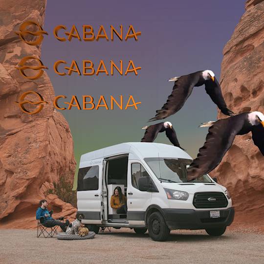 White Cabana van parked between red rock formations with three soaring eagles overhead, campers and dog relaxing outside
