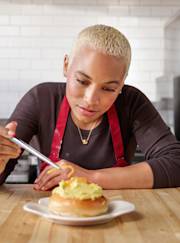 Pastry chef working in restaurant kitchen