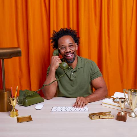 Mailchimp customer service team member guiding customers through phone support.