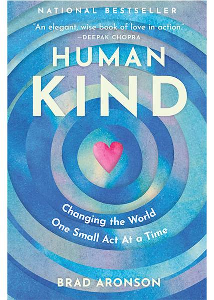 Book cover of "Human Kind" featuring concentric blue circles with a pink heart at center, subtitle about changing the world through small acts